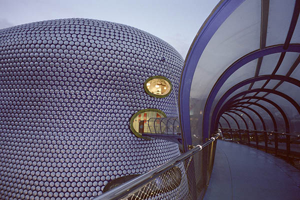 West Midlands Escorts walking across Selfridges Foot Bridge at Bullring, Birmingham