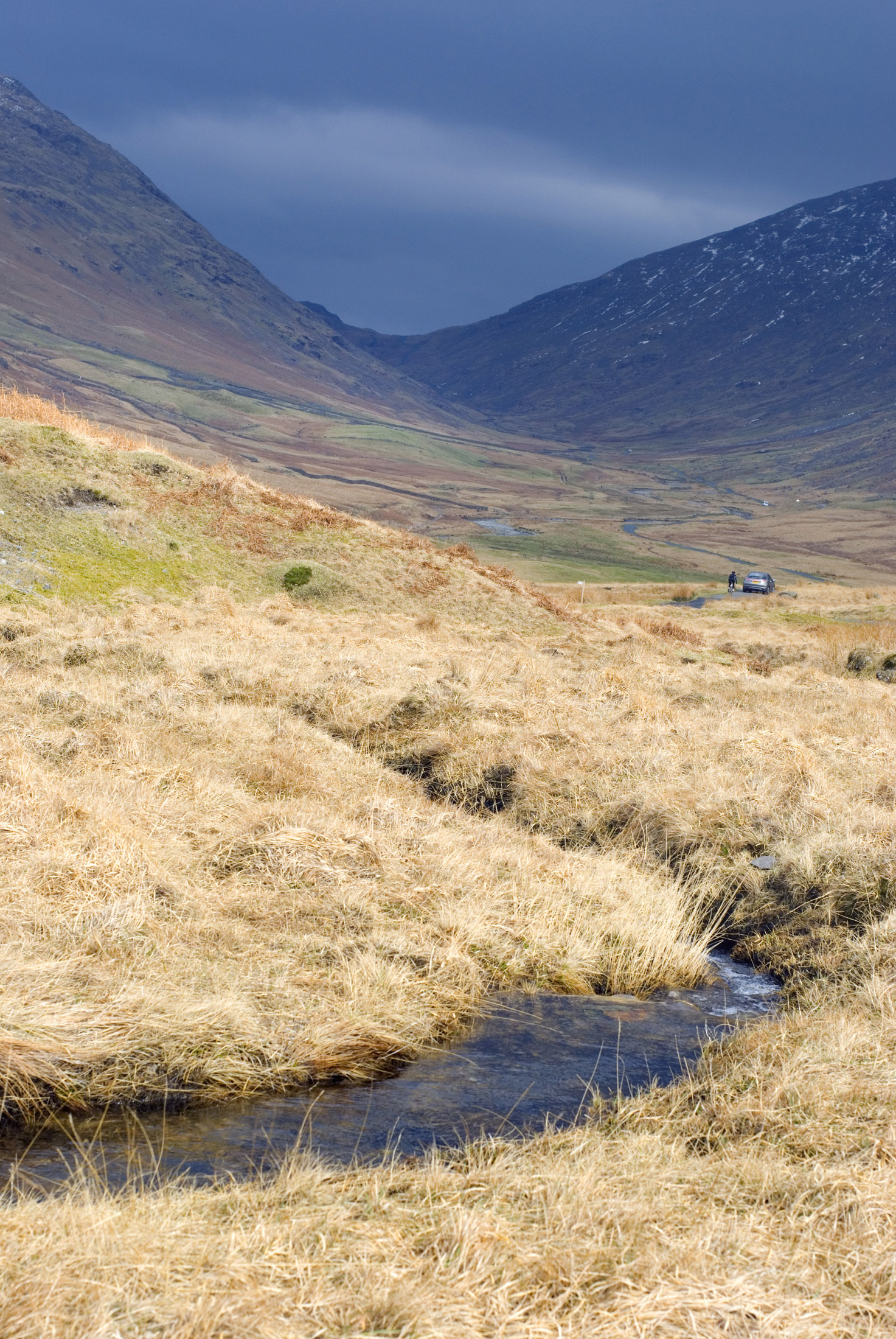 Escorts in Cumbria walking across the Hardknott Pass