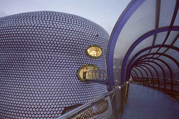 West Midlands Escorts walking across Selfridges Foot Bridge at Bullring, Birmingham